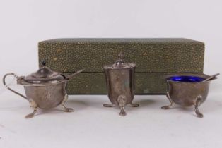 A George V three-piece silver cruet set, Birmingham 1932, cased