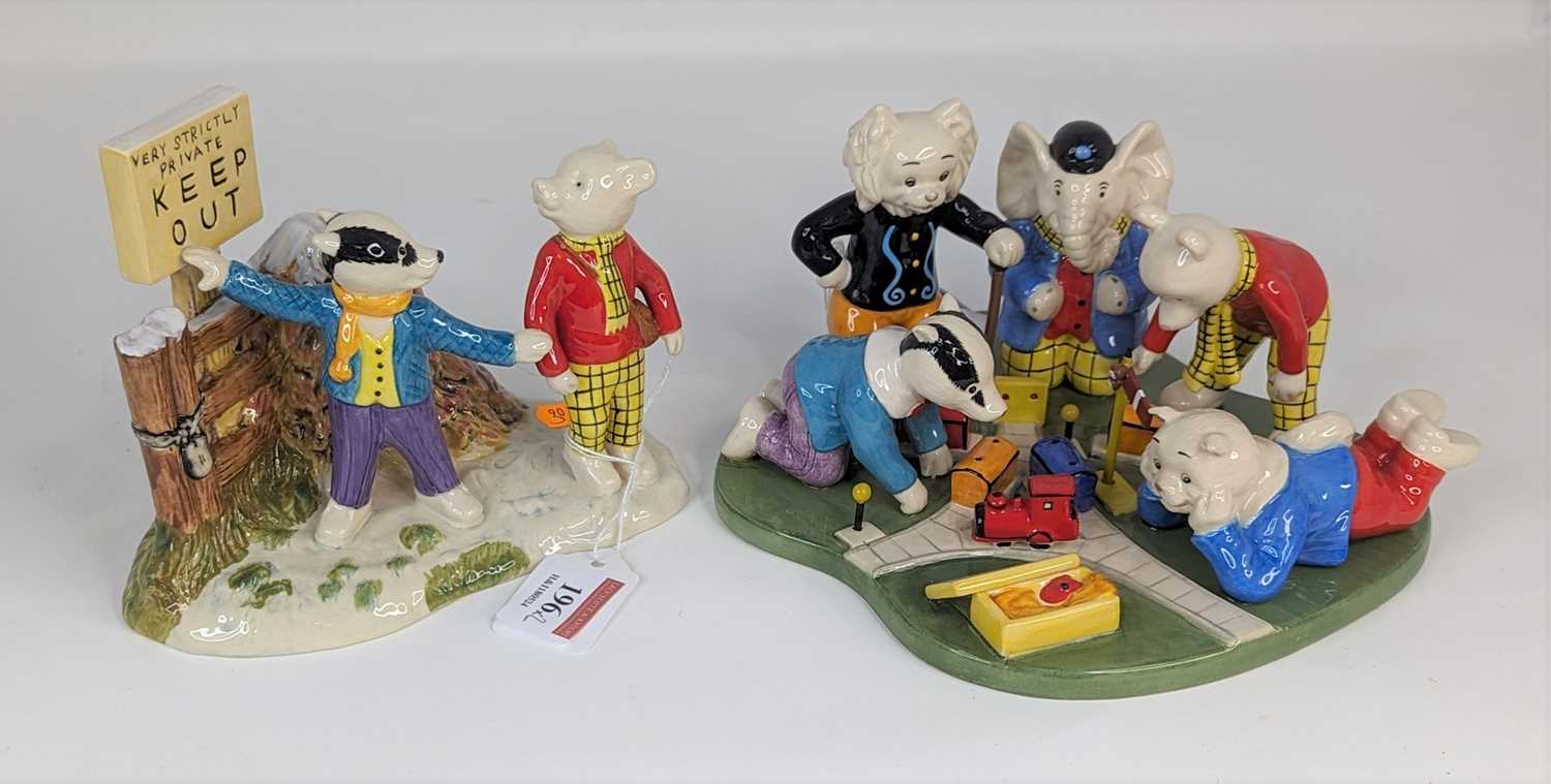 Two Royal Doulton Rupert Bear character figures to include 'Tempted to Trespass', and 'Rupert's