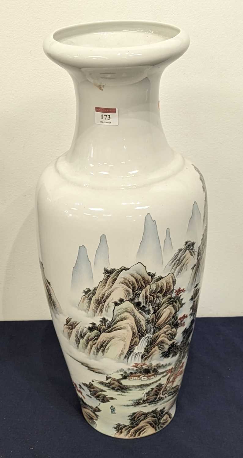 A Chinese porcelain vase decorated with mountain landscape, height 61cm Badly cracked and drilled.No