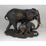 A bronzed resin elephant group, height 28cm