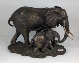 A bronzed resin elephant group, height 28cm