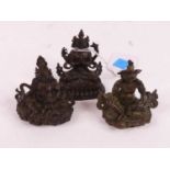 Three Chinese bronzed metal miniature Buddha figures, the largest h.5.5cm Of recent manufacture,.