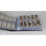 An album containing 18 full sets of cigarette cards, to include Wills and Mitchells SETS INCLUDE: