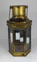 A vintage brass lantern, having swing handle and mirrored back, height 41cm Top rail of interior