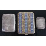 A silver pocket cigarette case; together with a silver plated vesta case; and a gilt metal and