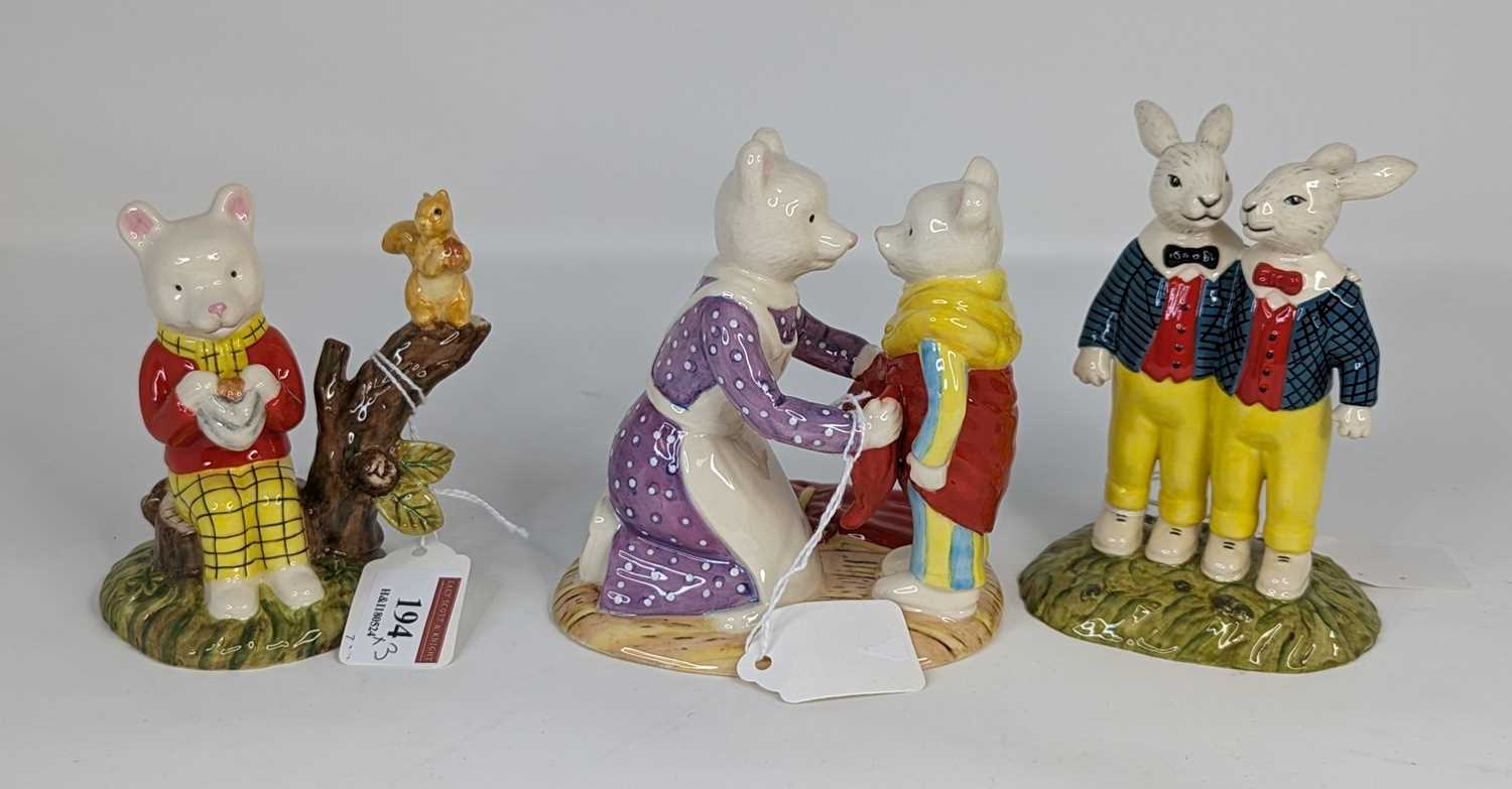 A collection of three Royal Doulton Ruper Bear character figures to include 'We Meant to put them