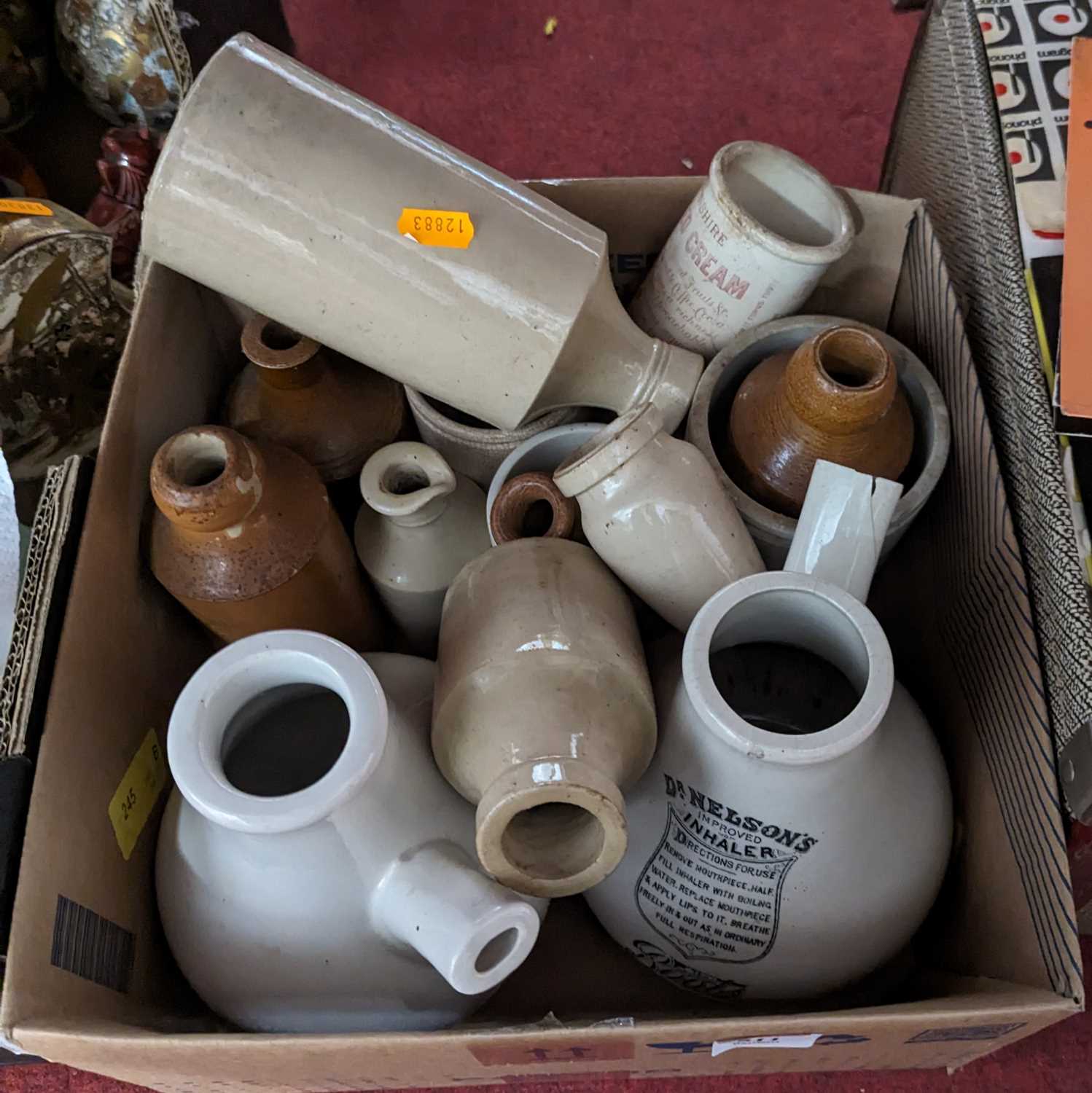 A collection of stoneware jars and bottles