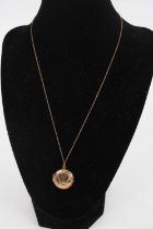 A 9ct gold finelink neck chain, 1g, with gold plated locket (2) Chain length 44cm