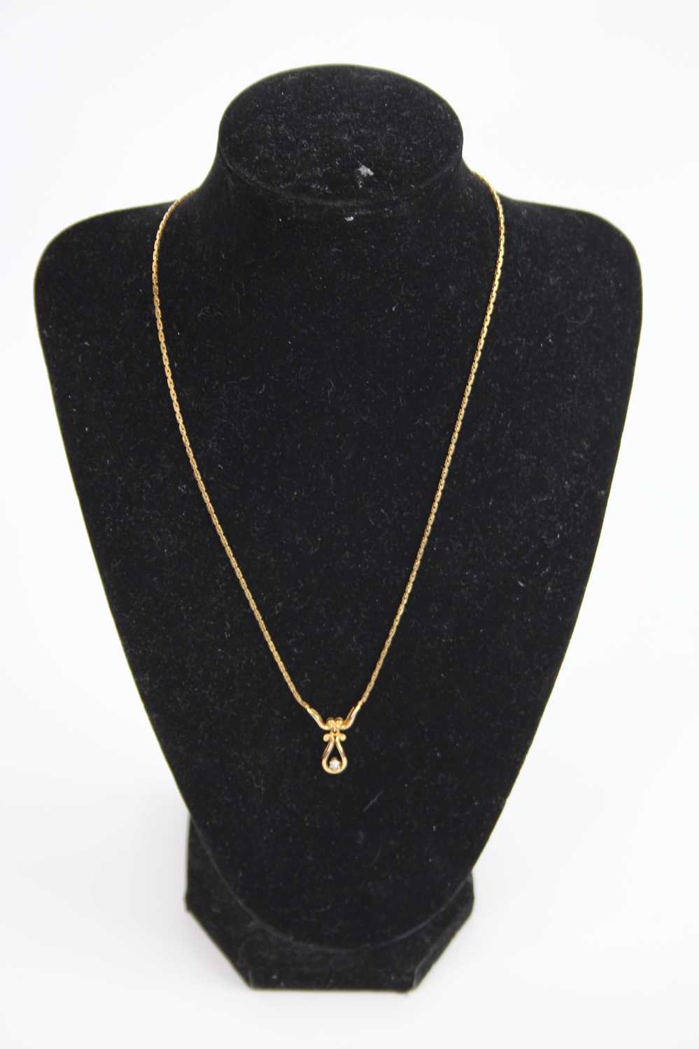 A modern 9ct gold flat curb link neck chain, with Albert, length 48cm, together with one other 9ct - Image 2 of 2