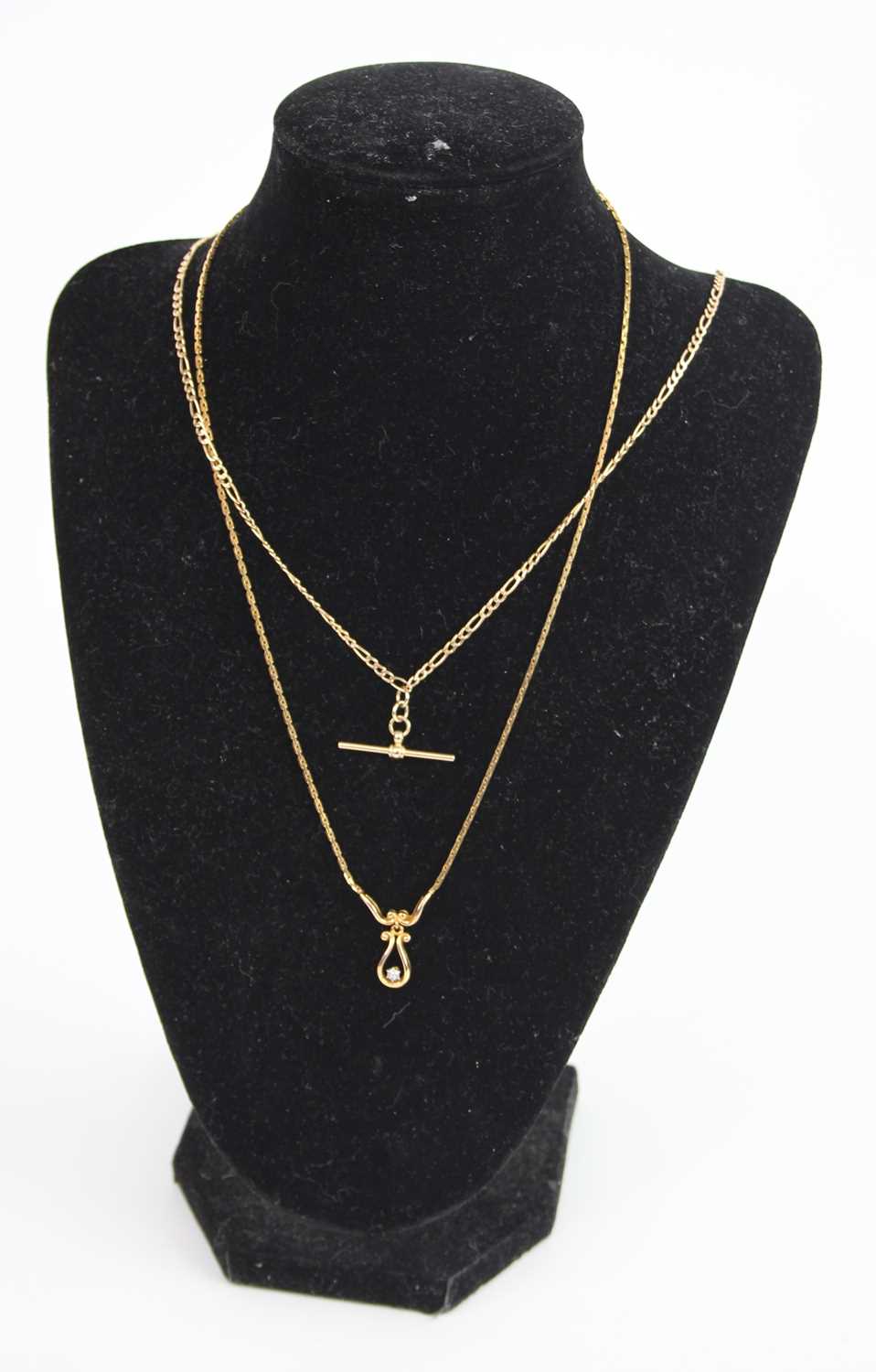 A modern 9ct gold flat curb link neck chain, with Albert, length 48cm, together with one other 9ct