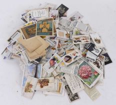A collection of cigarette cards, to include Ogden's and Churchman's