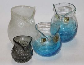 A collection of four 20th century coloured art glass vases