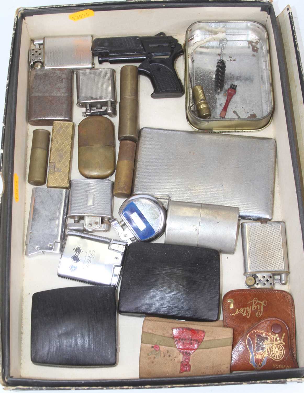 A collection of vintage lighters to include a novelty pistol example