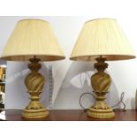 A pair of composite table lamps, each of wrythen form with acanthus leaf decoration, height
