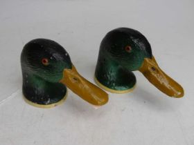 A pair of novelty painted metal bottle openers, each in the form of a duck's head, length 12cm