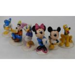 A collection of six Royal Doulton Mickey Mouse Collection figures, to include Mickey, Minnie, Pluto,