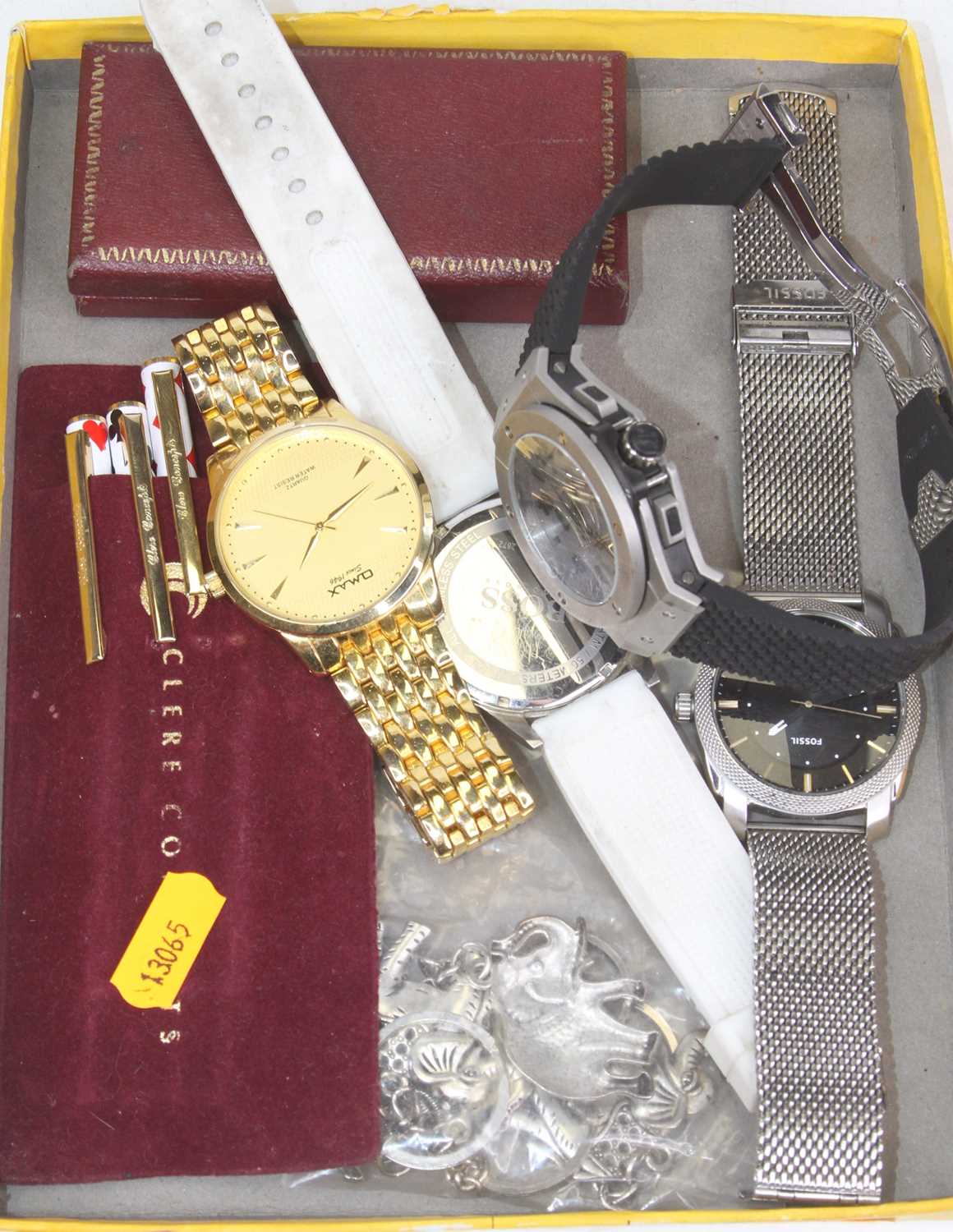 Miscellaneous items to include gent's fashion wrist watches, a cased set of four propelling pencils,