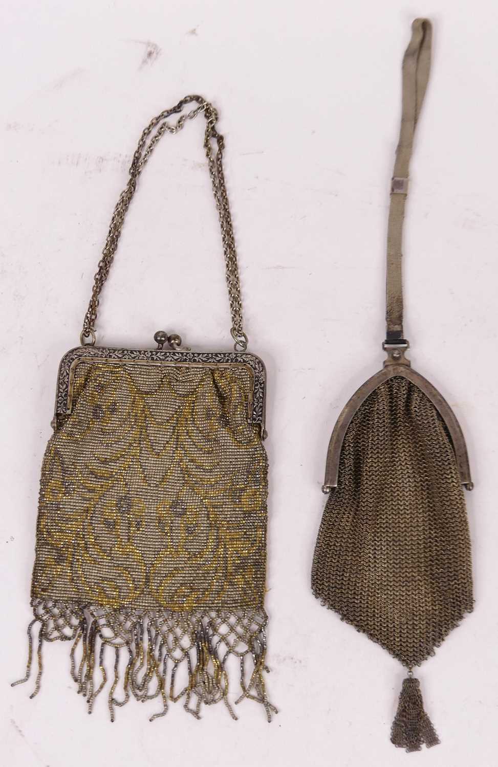 A lady's white metal chainmail evening bag, together with a metal mounted beaded evening bag