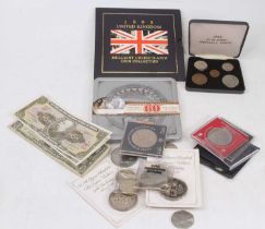 A collection of mixed coinage, banknotes and militaria, to include a 1995 United Kingdom