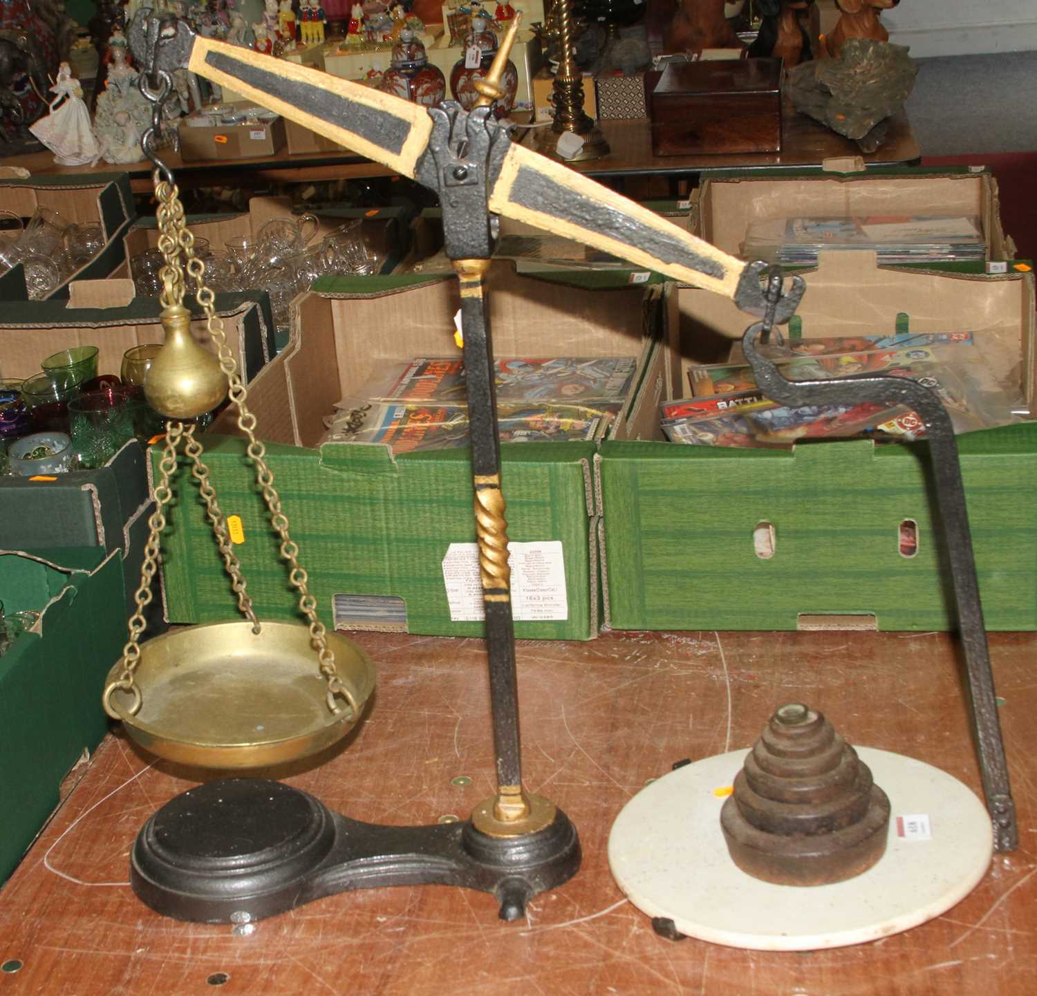 A 19th century cast iron and brass balance scale, height 57cm, together with a graduated set of