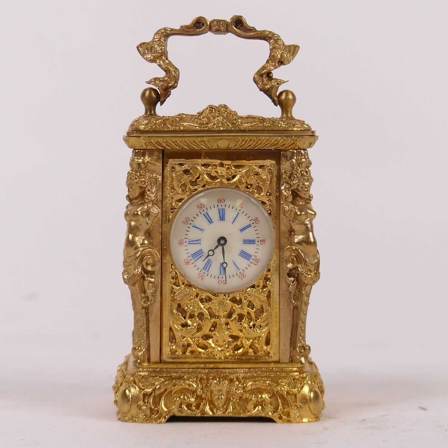 A modern gilt metal cased minuet carriage timepiece, having an enamelled dial with Roman numerals - Image 2 of 3