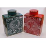 Two reproduction pottery tea canisters, each decorated with a postage stamp, height 27cm
