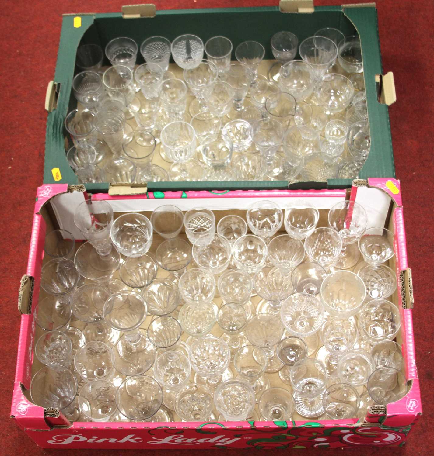 Two boxes of 19th century and later drinking glasses, to include acid etched liqueur glasses, and