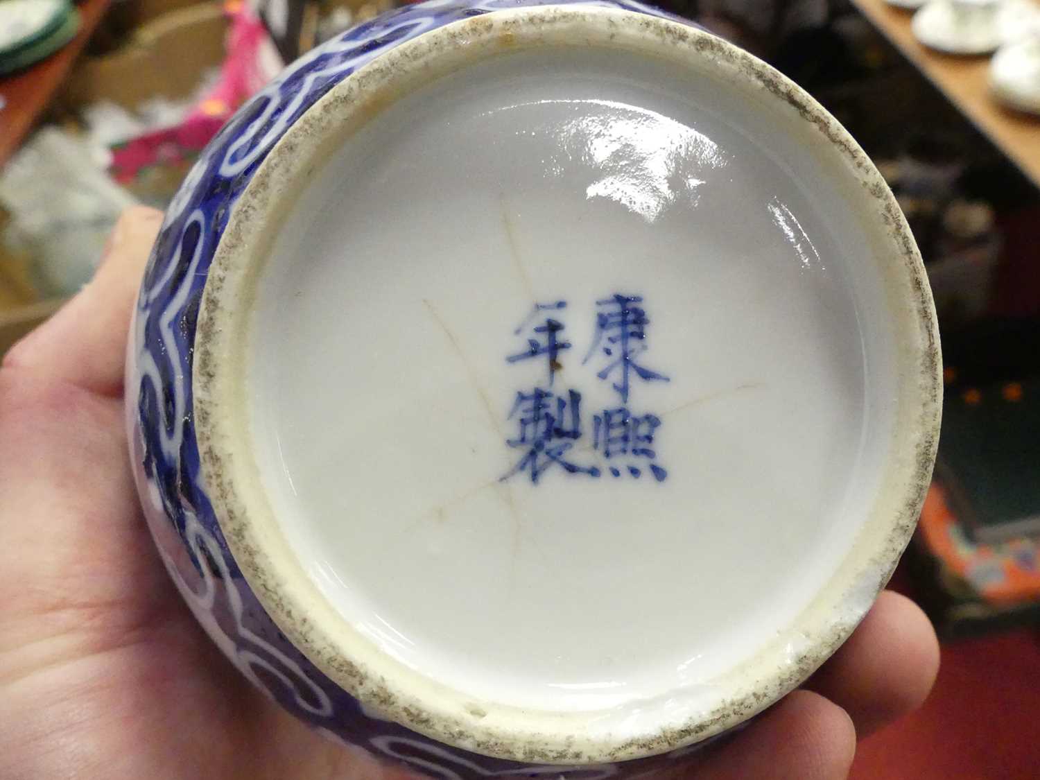 A Chinese blue and white glazed bottle vase, under glaze decorated with birds amongst flowers and - Image 4 of 4