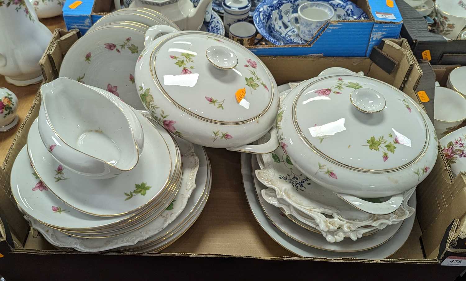 A Krister floral decorated part dinner service, to include tureens and meat plates