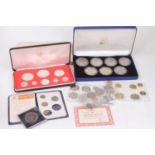 A collection of mixed coinage, to include a cased set of Elizabeth II crowns, Canadian Mint Caymen