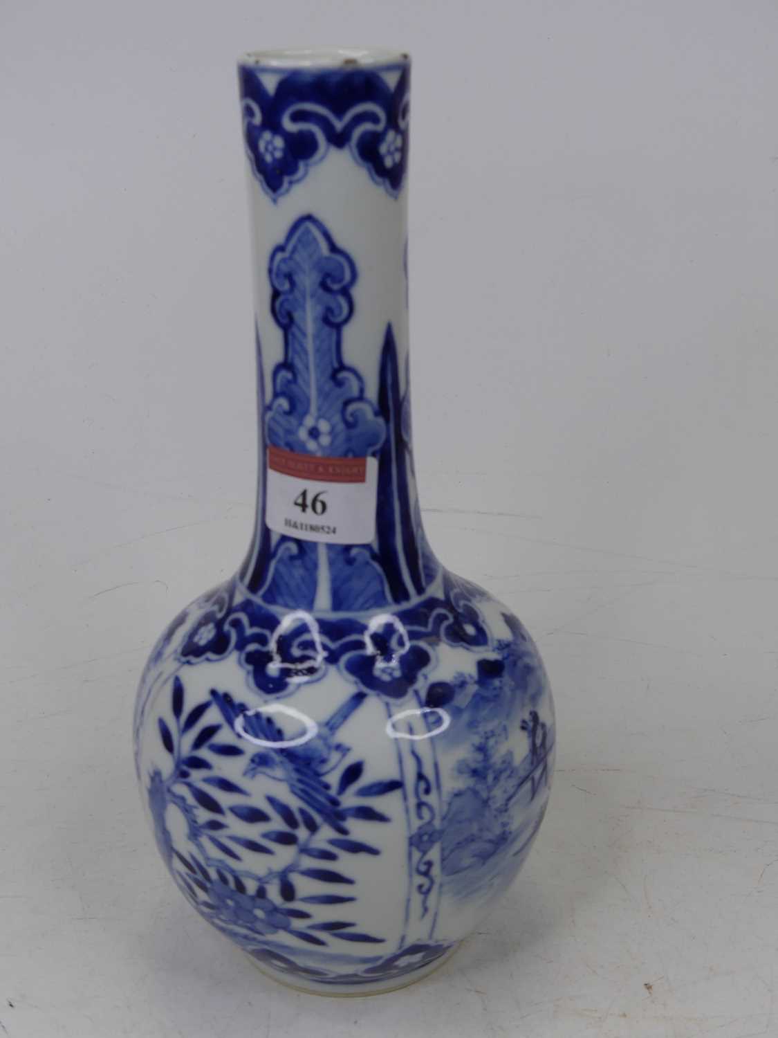 A Chinese blue and white glazed bottle vase, under glaze decorated with birds amongst flowers and - Image 2 of 4