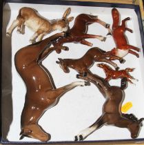 A Beswick pottery figure of a chestnut horse, height 13cm, together with various other Beswick