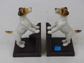 A pair of novelty painted cast iron bookends, each in the form of a jack russell, height 15cm