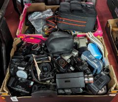 An extensive collection of cameras, to include examples by Canon, Pentax and Minolta; together