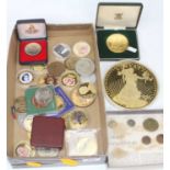 A collection of coins & medallions to include examples by Westminster, Franklin mint & Pobjoy mint