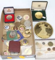 A collection of coins & medallions to include examples by Westminster, Franklin mint & Pobjoy mint