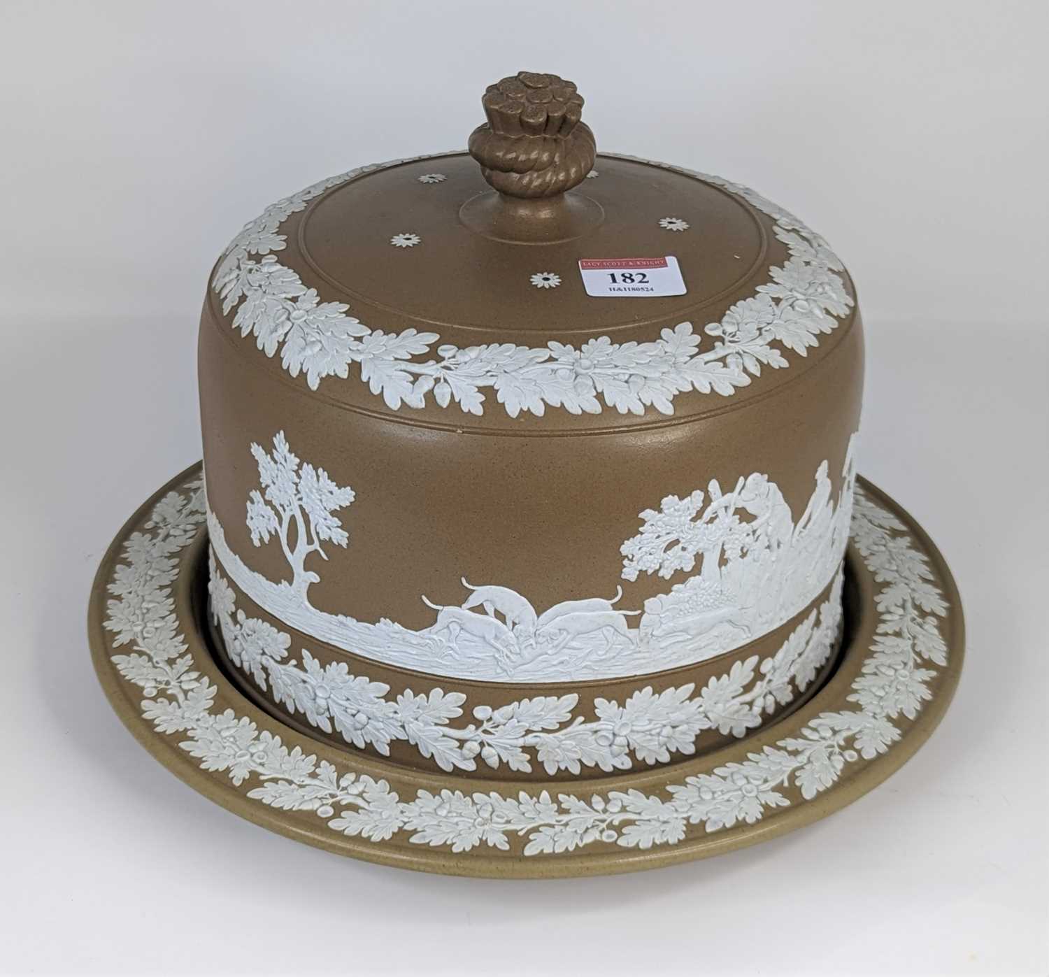 A Victorian brown jasper ware cheese dome and stand, height 23cm