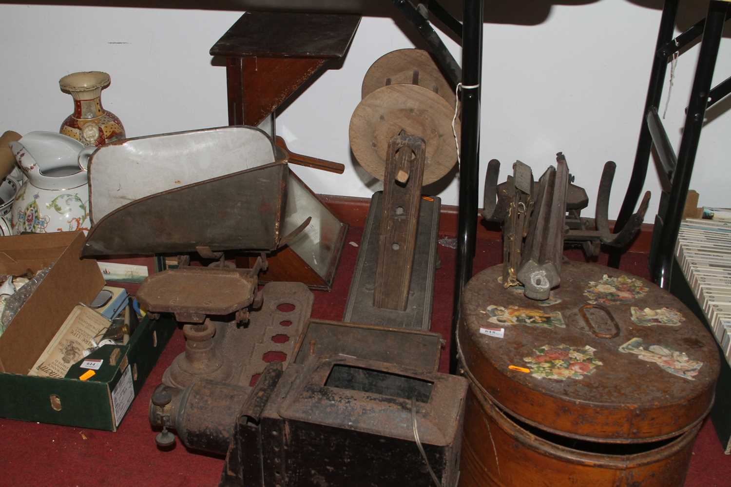 A collection of bygones, to include painted metal hat box, cast iron scales, magic lantern projector