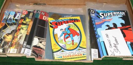 A collection of DC comic books to include The Adventures of Superman and Batman Detective
