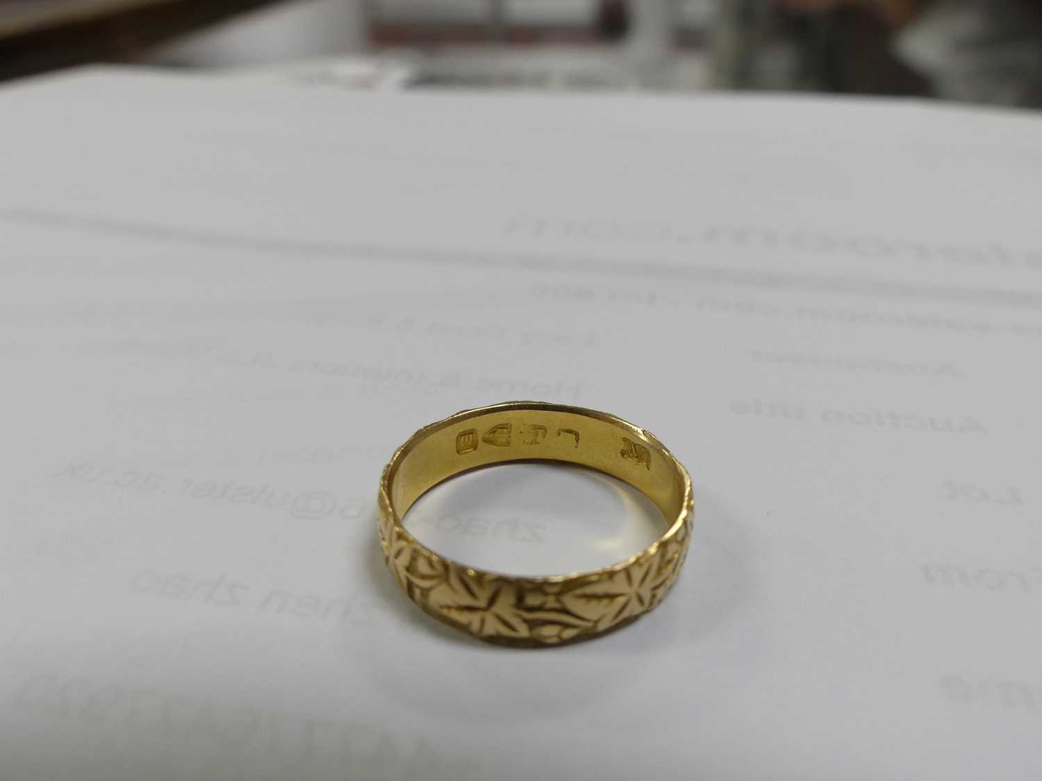An 18ct gold and engraved wedding band, 3.8g, sponsor EV?, size N Marks a bit rubbed,light - Image 2 of 5