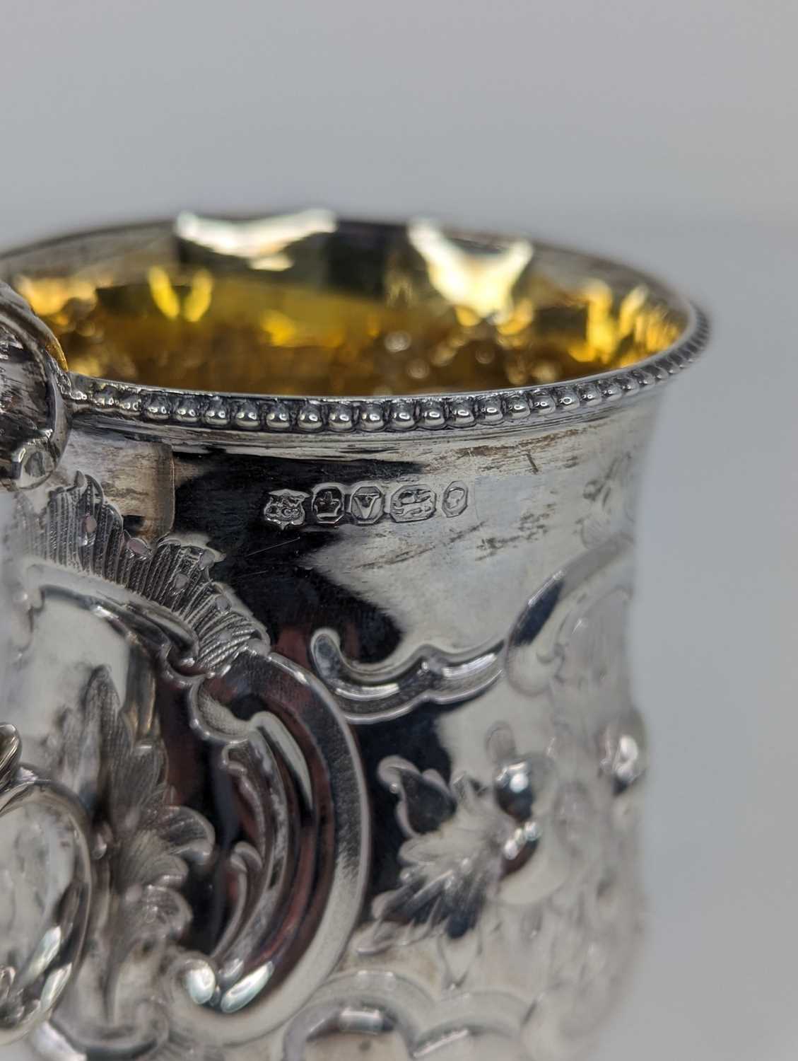 A Victorian silver christening tankard, of bell shape, having floral repousse decoration, - Image 5 of 5