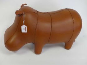 A leather clad footstool, in the form of a hippo, length 52cm Condition is good overall, no tears or