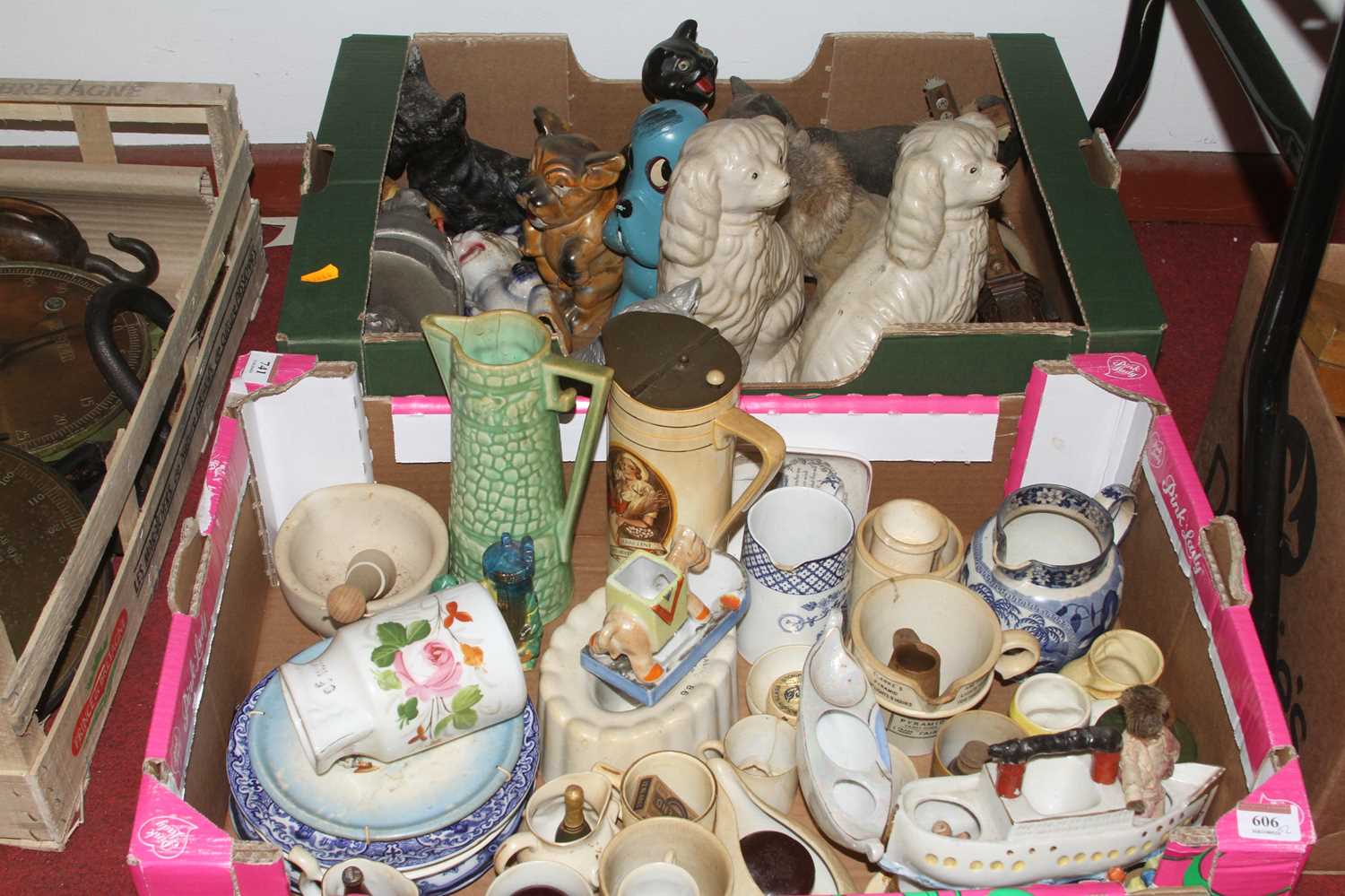 A collection of ceramics to include Staffordshire spaniels, jelly moulds, and relief moulded jugs (