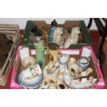 A collection of ceramics to include Staffordshire spaniels, jelly moulds, and relief moulded jugs (