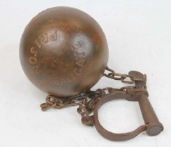 A reproduction metal ball and chain