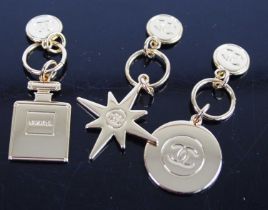 After Chanel, assorted gilt metal pendant charms