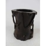 A Chinese hardwood brush pot of naturalistic cylindrical form, height 11cm
