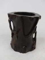 A Chinese hardwood brush pot of naturalistic cylindrical form, height 11cm
