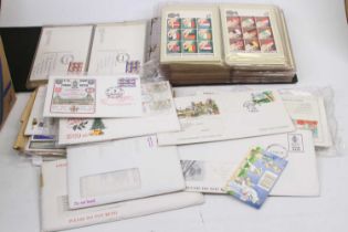 A collection of presentation packs of first day covers PHQ cards and stamps