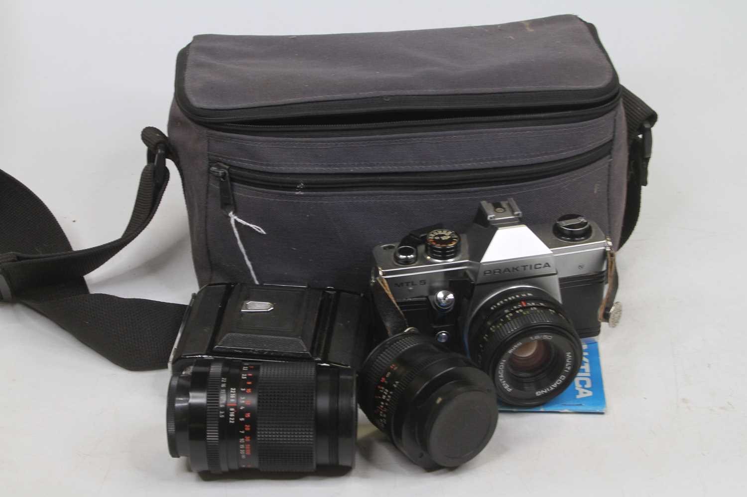 A Praktica NTL5 film camera; together with various lenses to include Carl Zeiss Jena DDR 74127,